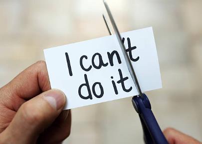 Person cutiin part of the words from I can't do it to I can do it overcoming doubts and beliefs