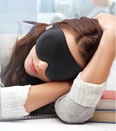 Woman sleeping wearing a Yfong Sleep Mask