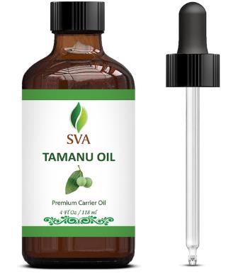 Bottle of Tamanu Premium Carrier Oil with dropper.