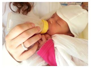 Mother Giving Formular Fed Bottle due to Breast Feeding not being feasible